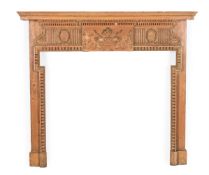 A VICTORIAN PINE CARVED CHIMNEY PIECE OR FIRE SURROUND, 19TH CENTURY