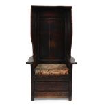 AN OAK CANOPIED LAMBING CHAIR, POSSIBLY WELSH, LATE 17TH OR EARLY 18TH CENTURY