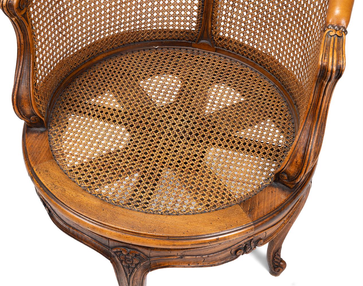 A CARVED WALNUT AND CANED DESK CHAIR, FRENCH, LATE 19TH OR EARLY 20TH CENTURY - Image 3 of 5
