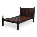 AN OAK BED INCORPORATING ASSOCIATED 17TH CENTURY AND LATER ELEMENTS