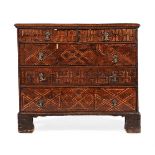 AN UNUSUAL GEORGE III OAK AND PARQUETRY CHEST OF DRAWERS, 18TH CENTURY
