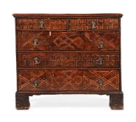 AN UNUSUAL GEORGE III OAK AND PARQUETRY CHEST OF DRAWERS, 18TH CENTURY