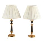 A PAIR OF BRONZE AND GILT CANDLESTICK LAMPS, MID 19TH CENTURY