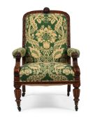 A VICTORIAN CARVED OAK ARMCHAIR, CIRCA 1870