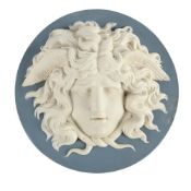 A PALE-BLUE JASPER ROUND PLAQUE SPRIGGED IN WHITE WITH THE MASK OF MEDUSA, LATE 18TH CENTURY