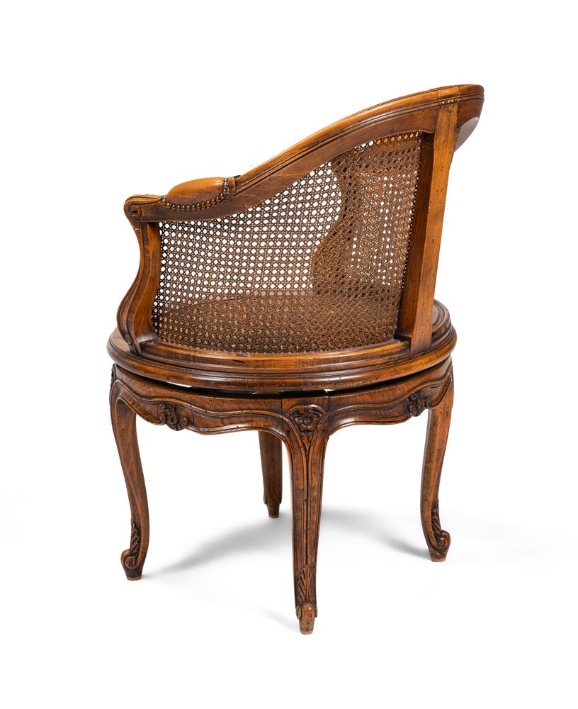 A CARVED WALNUT AND CANED DESK CHAIR, FRENCH, LATE 19TH OR EARLY 20TH CENTURY - Image 5 of 5
