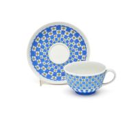 A WEDGWOOD JASPER 'DICE WORK' TEACUP AND SAUCER, CIRCA 1800