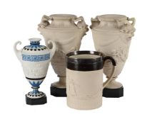 A PAIR OF TURNER STONEWARE URNS, CIRCA 1800