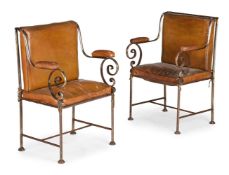 A PAIR OF CONTINENTAL STEEL AND LEATHER UPHOLSTERED ARMCHAIRS, PROBABLY ITALIAN, 20TH CENTURY