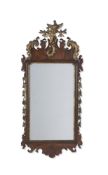 A GEORGE II MAHOGANY AND PARCEL GILT MIRROR, CIRCA 1750