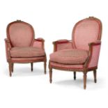 A PAIR OF CARVED BEECH AND UPHOLSTERED FAUTEUIL, LATE 19TH OR EARLY 20TH CENTURY