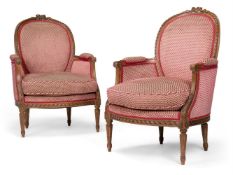 A PAIR OF CARVED BEECH AND UPHOLSTERED FAUTEUIL, LATE 19TH OR EARLY 20TH CENTURY