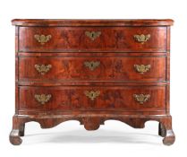 A FIGURED WALNUT INVERTED SERPENTINE COMMODE, NORTH ITALIAN, LATE 18TH CENTURY