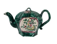 A STAFFORDSHIRE SALT- GLAZED STONEWARE HEXAGONAL TEAPOT AND COVER, CIRCA 1760