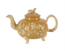 A STAFFORDSHIRE POTTERY TEAPOT AND COVER, ATTRIBUTED TO HUMPREY PALMER, CIRCA 1755-1760
