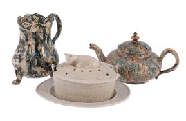 A STAFFORDSHIRE AGATE WARE TEAPOT AND COVER OF COMPRESSED GLOBULAR FORM, MID 18TH CENTURY