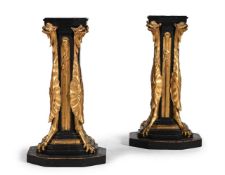 A PAIR OF EBONISED AND PARCEL-GILT OCTAGONAL PEDESTALS, CIRCA 1900