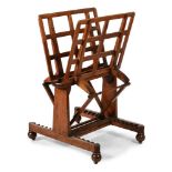 AN EARLY VICTORIAN OAK FOLIO STAND, IN THE MANNER OF GILLOWS