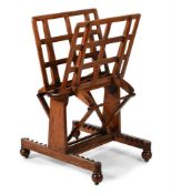 AN EARLY VICTORIAN OAK FOLIO STAND, IN THE MANNER OF GILLOWS