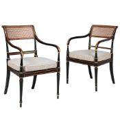 A MATCHED PAIR OF BLACK, POLYCHROME, AND GILT PAINTED ELBOW CHAIRS, IN REGENCY STYLE, 19TH CENTURY