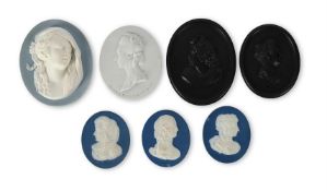 SEVEN ASSORTED DRY-BODIED STONEWARE OVAL PORTRAIT PLAQUES OF HISTORICALLY NOTABLE WOMEN