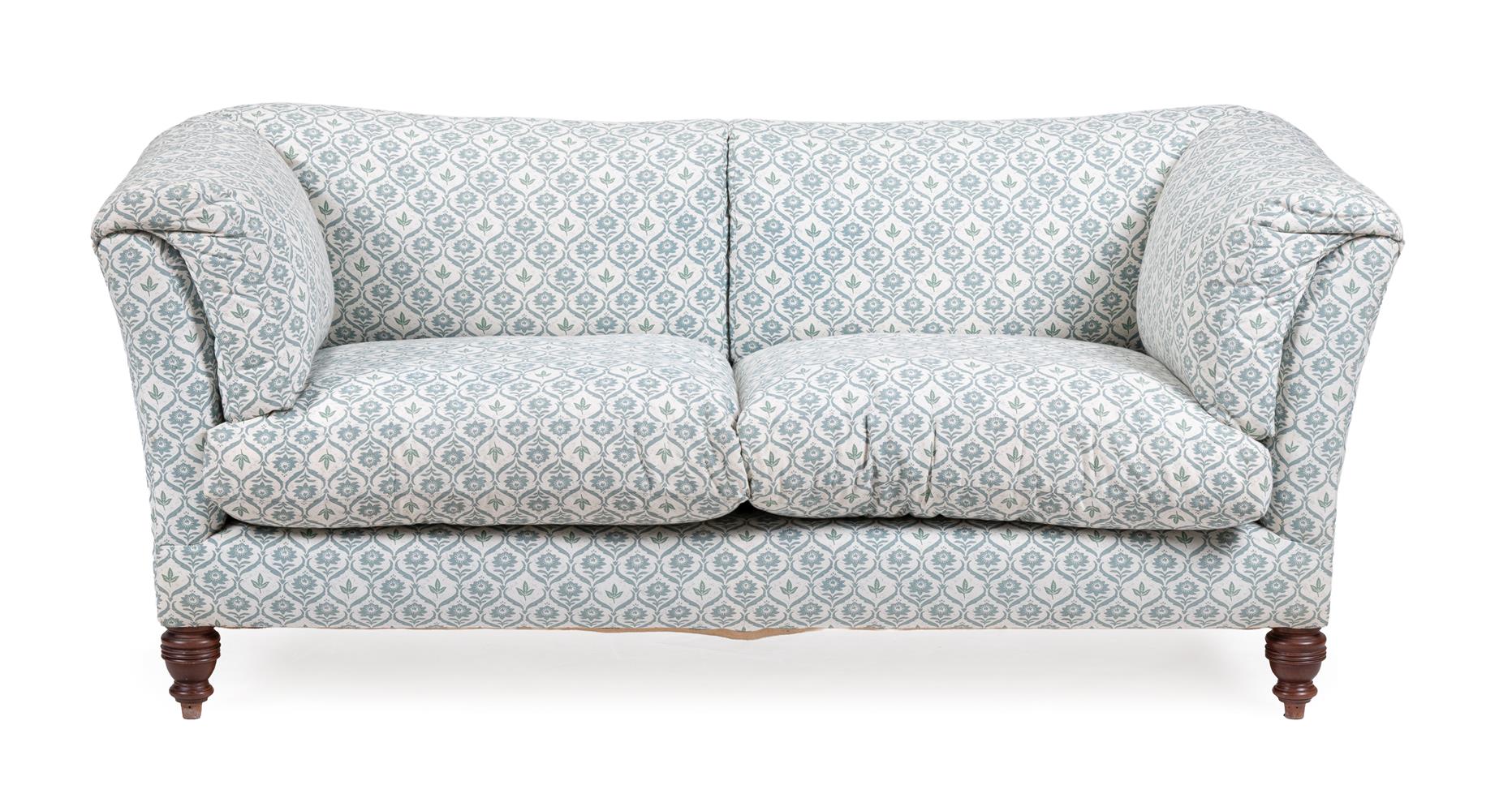 A TWO SEATER SOFA, IN THE MANNER OF HOWARD AND SONS, LATE 20TH CENTURY