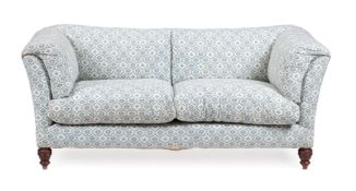 A TWO SEATER SOFA, IN THE MANNER OF HOWARD AND SONS, LATE 20TH CENTURY