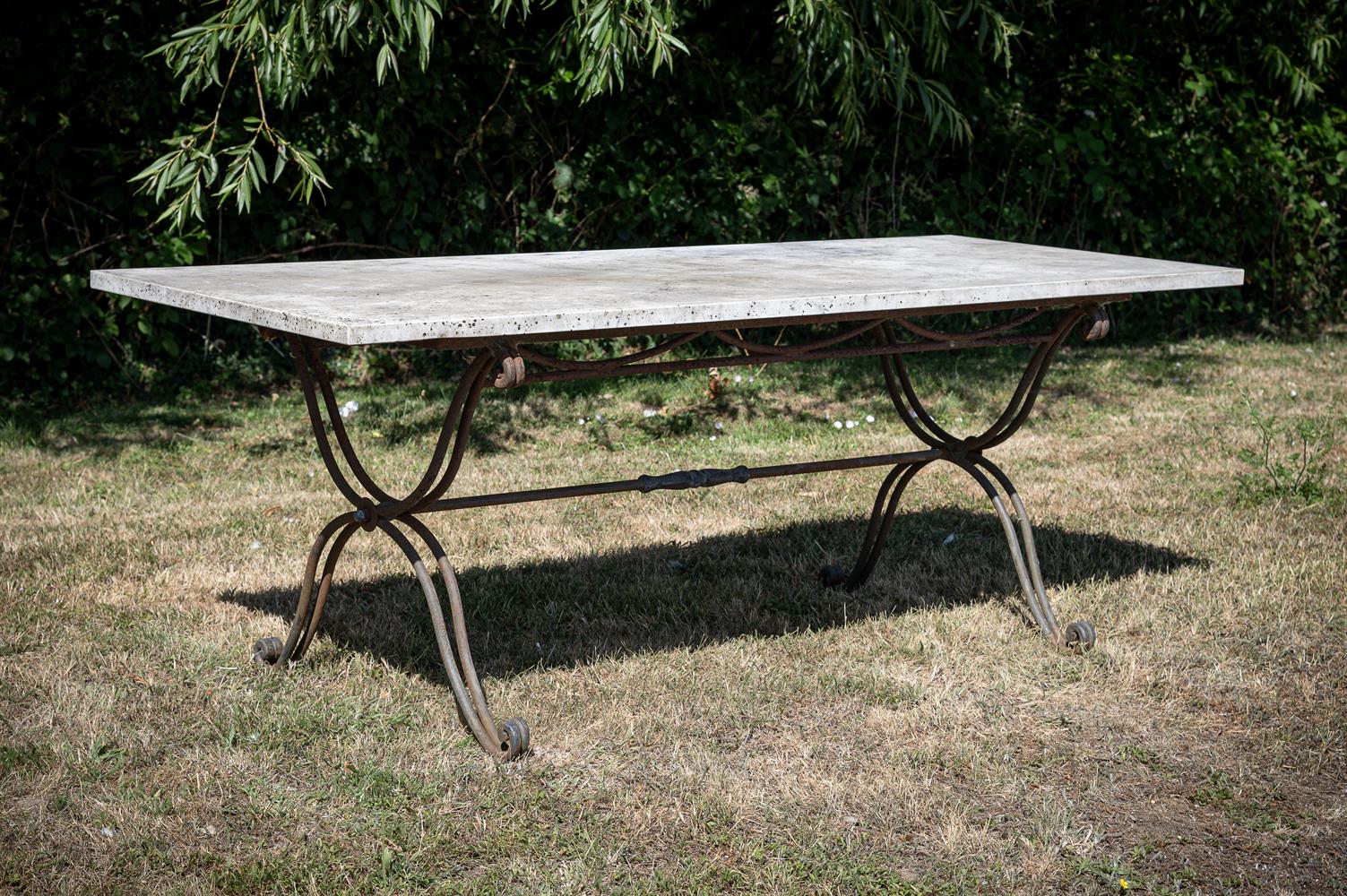 A MARBLE TOPPED GARDEN TABLE