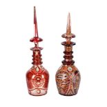 TWO NEAR EASTERN RED-FLASHED AND CLEAR GLASS DECANTERS, PROBABLY BEYKOZ, 19TH CENTURY