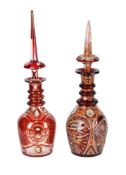 TWO NEAR EASTERN RED-FLASHED AND CLEAR GLASS DECANTERS, PROBABLY BEYKOZ, 19TH CENTURY