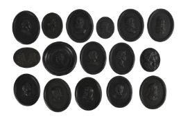 A SELECTION OF MOSTLY WEDGWOOD BLACK BASALT MEDALLIONS OF CLASSICAL SUBJECTS, VARIOUS DATES
