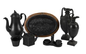 A WEDGWOOD & BENTLEY BLACK BASALT OVAL PLAQUE, CIRCA 1773