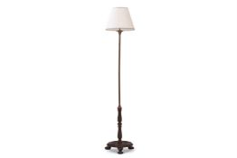 A HARDWOOD AND BRASS FLOOR STANDING LAMP, THE BASE ANGLO-INDIAN