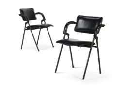 A PAIR OF BLACK LEATHER FOLDING ARMCHAIRS, ATTRIBUTED TO JACQUES ADNET (1900-1984)