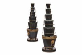 A PAIR OF GOLD AND BLACK PAINTED TOLE TIERED PLANTERS, LATE 19TH/EARLY 20TH CENTURY