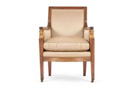 A FRENCH EMPIRE MAHOGANY AND PARCEL GILT ARMCHAIR, EARLY 19TH CENTURY