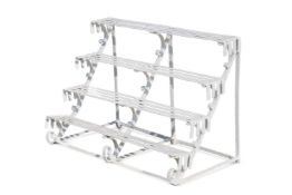 A WHITE PAINTED WROUGHT IRON FOUR TIER PLANT STAND, PROBABLY 19TH CENTURY
