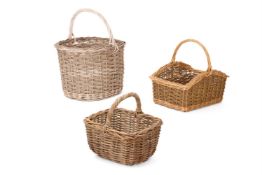 THREE WICKER LOG BASKETS OF VARYING SIZE, MODERN