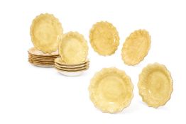 TEN YELLOW GLAZED POTTERY PLATES AND SEVEN MATCHING BOWLS, BY ESTE CERAMICHE PORCELLANE