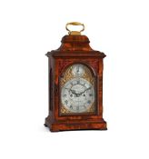 A FINE GEORGE III FIGURED MAHOGANY TABLE CLOCK OF SMALLER PROPORTIONS