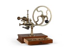 A SWISS OR GERMAN NICKEL-FINISH BRASS WATCHMAKER’S ROUNDING-UP TOOL