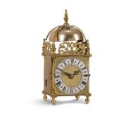 AN UNUSUAL BRASS MINIATURE LANTERN CLOCK
