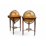 A FINE MATCHED PAIR OF REGENCY 21 INCH TERRESTRIAL AND CELESTIAL FLOOR-STANDING LIBRARY GLOBES