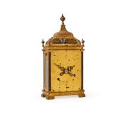 A RARE RENAISSANCE GILT BRASS AND IRON TABLE CLOCK