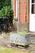 A SMALL EARLY GEORGE III LEAD PLANTER, DATED 1762