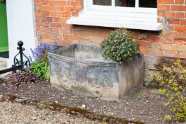 A GEORGE II RECTANGULAR LEAD CISTERN, DATED 1733