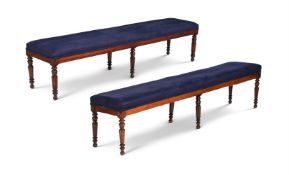 A PAIR OF GEORGE IV OAK AND UPHOLSTERED LONG STOOLS, ATTRIBUTED TO GILLOWS, CIRCA 1830