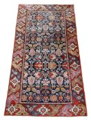 A NORTH WEST PERSIAN KELLEH OR GALLERY CARPET