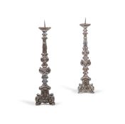 A PAIR OF ITALIAN SILVERED PRICKET TOP CANDLESTICKS, 18TH CENTURY