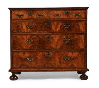 A WILLIAM & MARY FIGURED WALNUT CHEST OF DRAWERS, CIRCA 1690